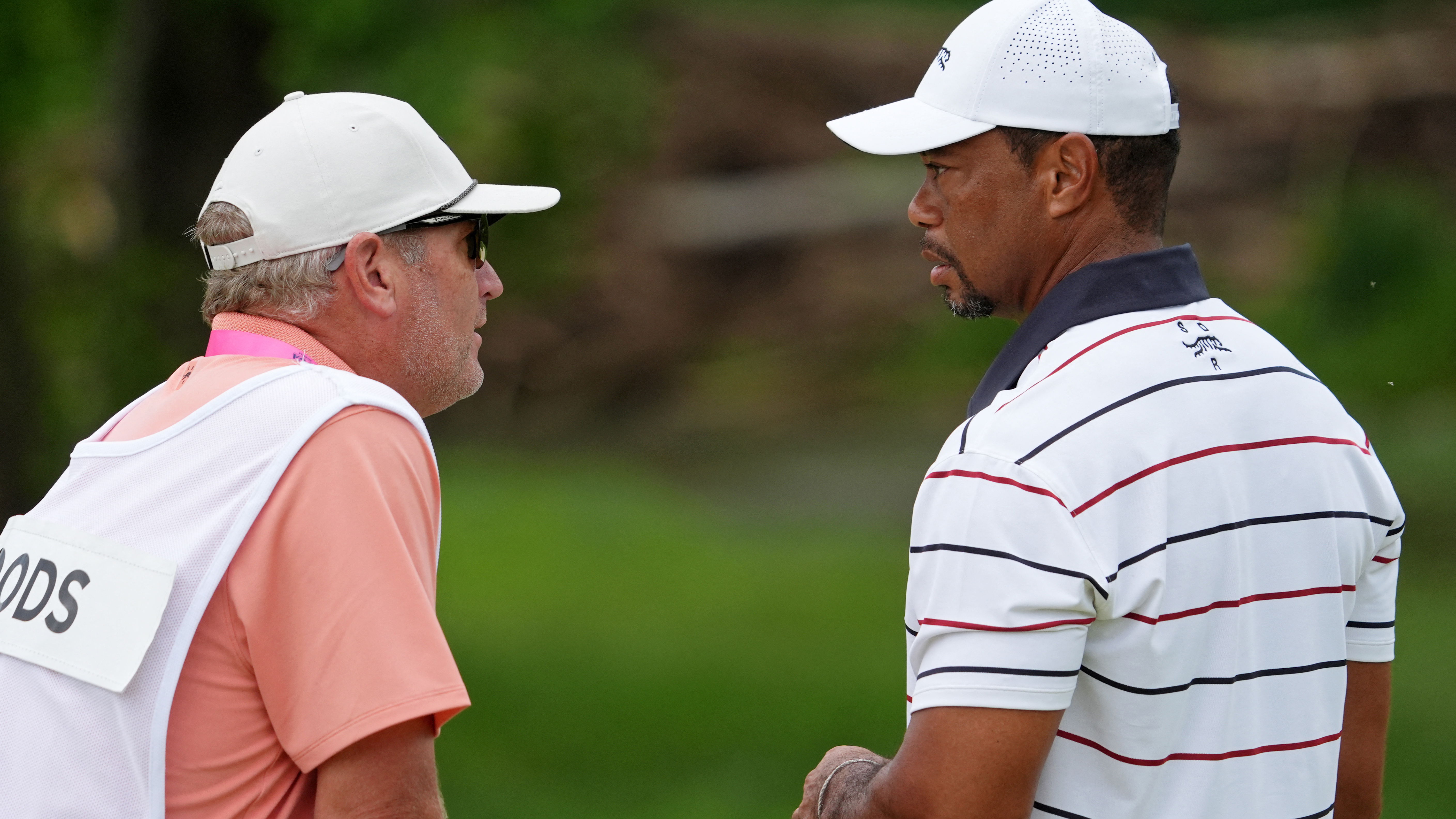 Lance Bennett with Tiger Woods